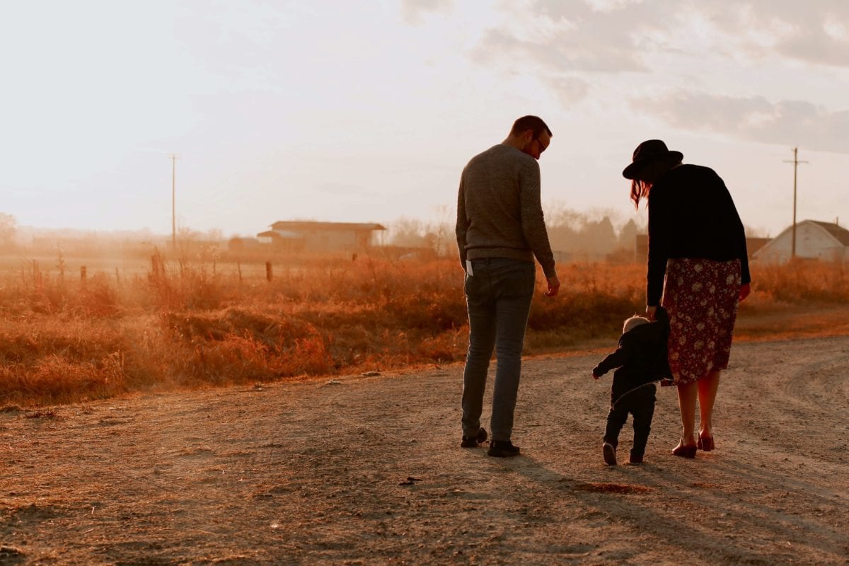 Amicable divorce couple with young toddler