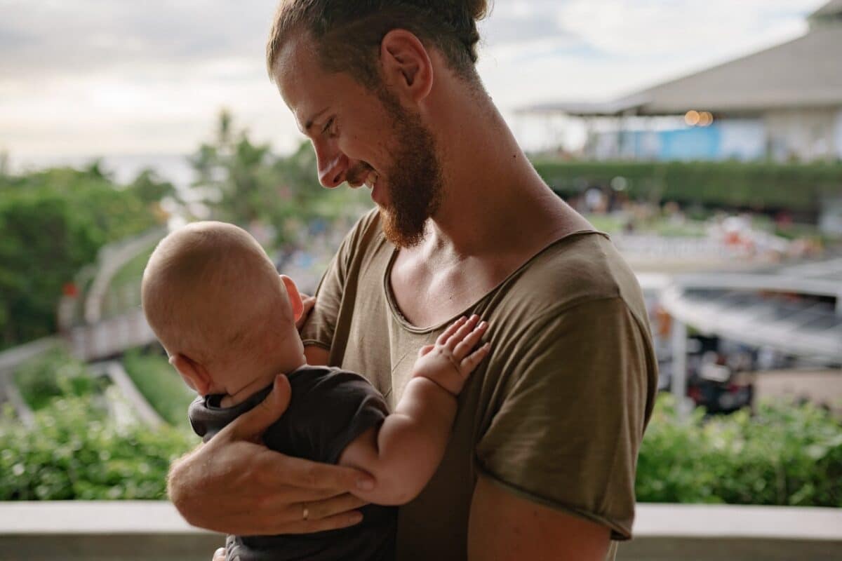 Father holding his baby exercising fathers rights in Australia